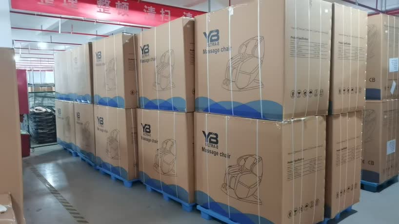 ארגזי כורסאות מסאז' YB ULTRA-8 ארוזים על משטחים, מוכנים למכולה
